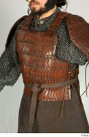 Photos Medieval Soldier in leather armor 5 Medieval clothing Medieval soldier brown gambeson chest armor leather armor 0002.jpg